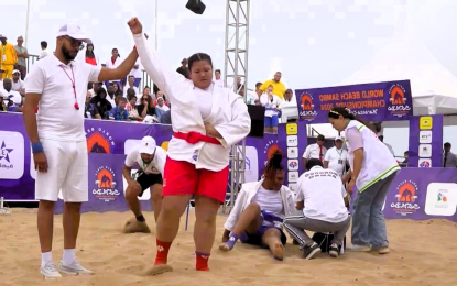 <p><strong>BRONZE WINNER</strong>. The referee raises the hand of Filipina Sydney Sy-Tancontian after the bronze medal match in the women's +72kg category at the World Beach Sambo Championships in Casablanca, Morocco on Sept. 8, 2024. She will lead the national team in two major tournaments which the Pilipinas Sambo Federation Inc. will host next year. <em>(Contributed photo)</em></p>