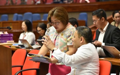 <p><strong>EDUCATION BUDGET.</strong> House Appropriations Committee vice-chair and Davao De Oro 1st District Rep. Maria Carmen Zamora (left) consults Education Secretary Sonny Angara as she defends the proposed budget of the Department of Education (DepEd) and its attached agencies for 2025 before the House plenary on Tuesday (Sept. 24, 2024). The House approved the DepEd budget amounting to PHP793.177 billion. <em>(Contributed photo)</em></p>