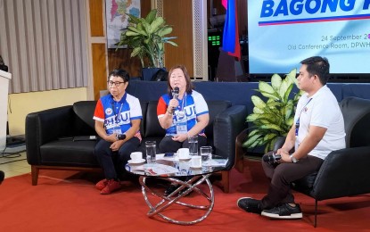 <p><strong>LAND USE.</strong> Department of Human Settlement and Urban Development (DGSUD) Western Visayas regional director Eva Maria P. Marfil (center) shares the accomplishments of their office during the Kapihan sa Bagong Pilipinas on Tuesday (Sept. 24, 2024). She encouraged local government units in the region to update their respective Comprehensive Land Use Plans. <em>(PNA photo by PGLena)</em></p>