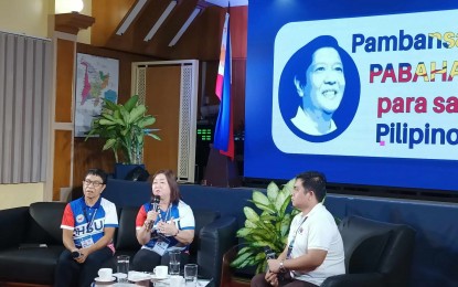 <p><strong>HOUSING PROGRAM.</strong> Department of Human Settlement and Urban Development regional director for Western Visayas Eva Maria Marfil (center) discusses the housing projects under the Pambansang Pabahay Para sa Pilipino (4PH) Housing program in the region during the Kapihan sa Bagong Pilipinas on Tuesday (Sept. 24, 2024). She said 29 of the 30 housing projects in the region are in various stages, while one is already in its production stage. <em>(PNA photo by PGLena)</em></p>