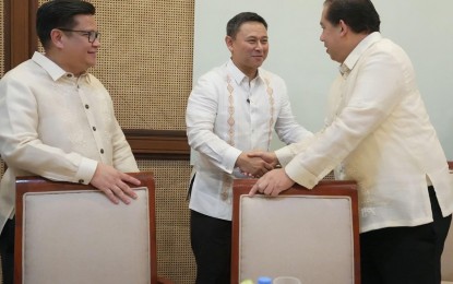 <p><strong>BUDGET APPROVED.</strong> Education Secretary Sonny Angara (center) shakes the hand of House Speaker Martin Romualdez (right) after the swift approval of the PHP793.17 billion proposed budget of the Department of Education on Tuesday (Sept. 24, 2024). Angara on Wednesday (Sept. 25, 2024) thanked lawmakers for supporting the DepEd’s key programs for the upcoming fiscal year. <em>(Photo courtesy of DepEd)</em></p>