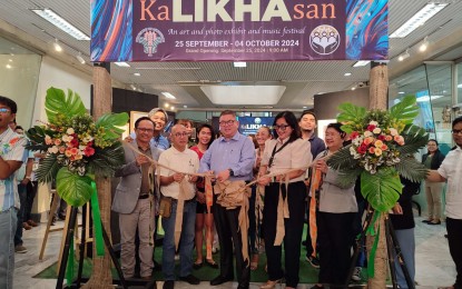 <p><strong>KALIKHASAN ART EXHIBIT.</strong> Agriculture Secretary Francisco Tiu Laurel Jr. (center) leads the launching of "KaLIKHAsan," an art and photo exhibit at the Department of Agriculture (DA) Main Office in Quezon City on Wednesday (Sept. 25, 2024). The KaLIKHAsan, which serves as the DA's first art and picture exhibit, features masterpieces of DA officials and employees. <em>(PNA photo by Stephanie Sevillano)</em></p>