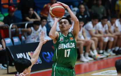 <p><strong>JUMPER.</strong> College of Saint Benilde point guard Jhomel Ancheta scores on a jumper during the game against Letran on Sept. 22, 2024. He was suspended for one day after hitting the back of Pao Javillonar's head in the game won by the Knights, 71-69. <em>(NCAA photo)</em></p>