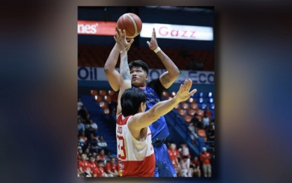 <p><strong>ATTEMPT.</strong> Arellano University's Lorenz Capulong challenges San Beda University's Daniel Celzo during the National Collegiate Athletic Association Season 100 men's basketball at FilOil EcoOil Centre in San Juan City on Saturday (Sept. 28, 2024). Arellano slipped past the defending champion, 72-70. <em>(NCAA photo)</em></p>