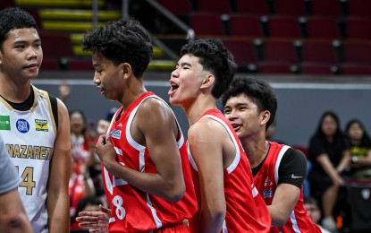 <p><strong>TEAMWORK</strong>. University of the East celebrates a successful play against National University Nazareth School in the UAAP Season 87 junior basketball at Mall of Asia Arena on Saturday (Sept. 28, 2024). UE won, 89-64, to remain unbeaten after five outings. <em>(UAAP photo)</em></p>