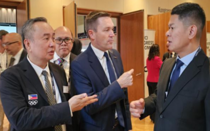 <p><strong>PH CYCLING’S BOLD MOVE</strong>. National Olympic committee and cycling federation presidents (from left) Abraham Tolentino of the Philippines, David Lappartient of France and Raja Sapta Oktohari of Indonesia exchange notes during the International Cycling Union (UCI) 193rd Congress in Zurich, Switzerland over the weekend (Sept. 28, 2024). Tolentino laid the groundwork for the country’s active return to track cycling during the UCI Congress. <em>(Photo from PhilCycling)</em></p>
<p><em> </em></p>