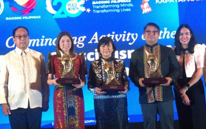 <p><strong>PEACE EXEMPLARS.</strong> Presidential Peace Adviser Secretary Carlito Galvez (left) leads the awarding of the Gawad Kapayapaan to extraordinary individuals and organizations for their invaluable contributions to the promotion and attainment of a just and lasting peace in the country in a ceremony held at the Manila Hotel on Monday (Sept. 30, 2024). The awardees include Department of Budget and Management (DBM) Secretary Amenah Pangandaman, founding member of the Southeast Asian Women Peace Mediators Miriam Coronel Ferrer, MILF Peace Negotiating Panel Chair Ghazali Jaafar (2nd to 4th from left, respectively), and the LGU of Kauswagan, Lanao del Norte. <em>(PNA photo by Marita Moaje)</em></p>