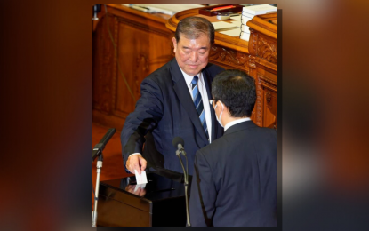 <p>Shigeru Ishiba casts his vote during a special Diet session in Tokyo, Japan, Oct. 1, 2024. <em>(Xinhua/Zhang Xiaoyu)</em></p>