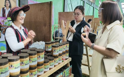 <p><strong>SMALL BUSINESSES</strong>. The peanut butter spreads being sold by a micro, small and medium enterprise (MSME) owner at the La Trinidad MSME event. Lawyer Samuel Gallardo, assistant regional director of the Department of Trade and Industry (DTI) Cordillera, said they continue to assist MSMEs to enhance their products and boost the sector. <em>(PNA photo by Liza T. Agoot)</em></p>