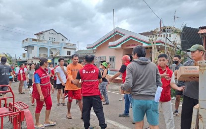 <p><strong>IMMEDIATE AID.</strong> Department of Social Welfare and Development (DSWD) Field Office 2 immediately distributes family food packs to affected families following the impact of Super Typhoon Julian in Batanes on Oct. 1, 2024. The DSWD on Wednesday (Oct. 2) said it has already released more than PHP9 million worth of humanitarian assistance for the families affected by the weather disturbance. <em>(DSWD photo)</em></p>