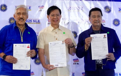 <p><strong>MACHO BLOC.</strong> Former Senate President Tito Sotto (from left), former Senator Ping Lacson, and Senator Lito Lapid file their certificates of candidacy before the Commission on Elections at the Manila Hotel Tent City on Wednesday (Oct. 2, 2024). The three, who members of the Macho bloc, are part of the 12 senatorial line-up of the Marcos administration in the 2025 midterm elections. <em>(Photo by Avito Dalan)</em></p>