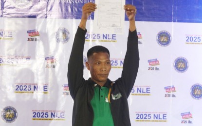 <p><strong>PARES DIWATA.</strong> Deo Balbuena, popularly known as Diwata and owner of the Diwata Pares Overload, faces the press after his group, the Vendors Party-list, filed a certificate of nomination - certificate of acceptance of nomination (CON-CAN) at the Manila Hotel Tent City in Manila on Wednesday (Oct. 2, 2024). If he gets seated as a congressman, Balbuena said he would push for a streamlined registration of permits for vendors. <em>(PNA photo by Avito Dalan)</em></p>