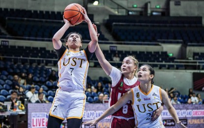 <p><strong>JUMPER.</strong> University of Santo Tomas guard Tacky Tacatac (No. 7) goes for a jumper during the game against University of the Philippines in the UAAP Season 87 women's basketball tournament at the Smart Araneta Coliseum in Quezon City on Wednesday (Oct. 2, 2024). The Growling Tigresses won, 84-60. <em>(UAAP photo)</em></p>