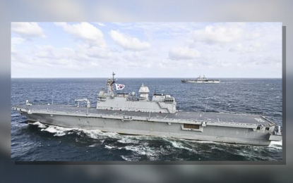 <p>This photo provided by the South Korean Navy on Oct. 3, 2024, shows the ROKS Marado (front) and the USS Boxer, amphibious assault ships participating in a combined South Korea-US marine exercise in the East Sea since Wednesday (Oct. 2, 2024). <em>(Yonhap)</em></p>