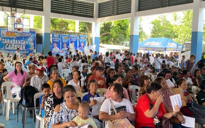 <p><strong>HEALTHCARE SERVICES.</strong> Residents of southern barangays in Legazpi City, Albay, wait for their turn during the "Tarabangan Caravan" of Ako Bicol (AKB) Party-List on Thursday (Oct. 3, 2024). The caravan has provided health, social, and livelihood services to more than 11,500 residents of the six provinces in the region from March to October this year. <em>(PNA photo by Connie Calipay)</em></p>