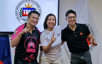 <p><strong>BOWLING TILT.</strong> Alabang Muntinlupa Bowling Association (AMBA) president Red Collantes, bowler Lara Posadas-Wong and tournament director Jowin Wong (from left) during the Tabloids Organization in Philippine Sports, Inc. (TOPS) “Usapang Sports” forum at the Rizal Memorial Sports Complex in Manila on Thursday (Oct. 3, 2024). The trio discussed the staging of the inaugural Alabang Muntinlupa Bowlers Association (AMBA) - Claudius Peters Open Championships scheduled at the Paeng's Freedom Bowl inside Robinson's Imus in Cavite on Oct. 12-20. <em>(PNA photo by Jean Malanum)</em></p>