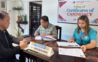 <p><strong>COC FILING</strong>. Lingayen, Pangasinan incumbent Mayor Leopoldo Bataoil (left) files his certificate of candidacy (COC) for congressman for the 2nd District of Pangasinan on Friday (Oct. 4, 2024). Bataoil was assisted by Commission on Elections provincial supervisor lawyer Ericson Oganiza (center). <em>(Photo courtesy of Leopoldo Bataoil's FB)</em></p>
<p> </p>