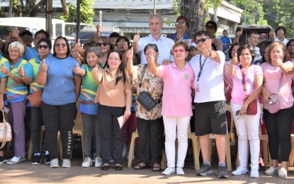 <p><strong>CELEBRATING THE ELDERLY</strong>. Negros Occidental Governor Eugenio Jose Lacson (center) joins members of the Federation of Senior Citizens’ Association of the Philippines and social welfare personnel from various local government units during the observance of the Elderly Filipino Week at the Capitol Lagoon and Park in Bacolod City on Friday (Oct. 4, 2024). “We join hands in celebrating a meaningful occasion that not only honors our elderly but also highlights and acknowledges their continued and lasting contributions to our society,” Lacson said. <em>(Photo courtesy of PIO Negros Occidental)</em></p>