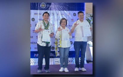 <p><strong>RETURNEE</strong>. Former senator Leila de Lima (center) files her certificate of nomination – certificate of acceptance of nomination (CON-CAN) as the first nominee of Mamamayang Liberal (ML) Party-list at the Manila Hotel Tent City on Saturday (Oct. 5, 2024). Former representatives Teodoro Baguilat of Ifugao (left) and Erin Tañada of Quezon joined her as the group’s second and third nominees. <em>(PNA photo by Ferdinand Patinio)</em></p>