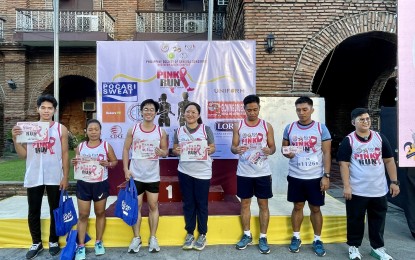 <p><strong>PINK RUN</strong>. Top runners get recognized during the pink run on Oct. 6, 2024 held in Laoag City, Ilocos Norte. The event aims to raise public awareness of the importance of early detection of breast cancer. <em>(Photo by Leilanie Adriano)</em></p>