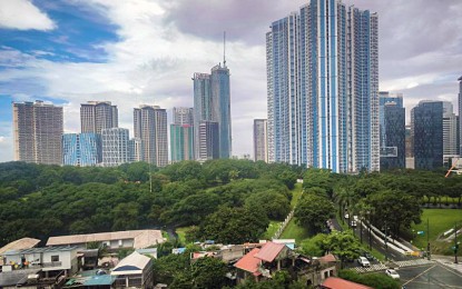 <p><strong>VIBRANT ECONOMY.</strong> The skyline and business district of Bonifacio Global City in Taguig City are photographed on a clear Friday afternoon on Oct. 4, 2024. The Philippine economy grew by 5.8 percent in the first three quarters of the year, outpacing other countries such as Malaysia, Indonesia, China, and Singapore. <em>(PNA photo by Joan Bondoc)</em></p>