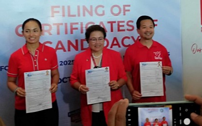 <p><strong>CANDIDATES.</strong> Former Caluya mayor Genevive Reyes, Antique Governor Rhodora J. Cadiao and resigned Interior and Local Government Undersecretary Jonathan Tan (from left) show their certificates of candidacy after their filing at the Commission on Elections provincial office on Monday (Oct. 7, 2024). Cadiao said among her plans are an additional hospital, conversion of capital San Jose de Buenavista into a city, and another legislative district for the province. <em>(PNA photo by Annabel Consuelo J. Petinglay)</em></p>