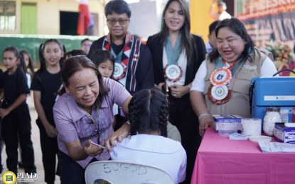 <p><strong>IMMUNIZATION CAMPAIGN.</strong> Health workers, local officials, and DOH representatives gather for the ceremonial launch of the month-long school-based immunization program in Valencia City, Bukidnon, on Monday (Oct. 7, 2024). The program aims to protect schoolchildren, including those from indigenous communities, from various diseases.<em> (Photo courtesy of Valencia CIO)</em></p>