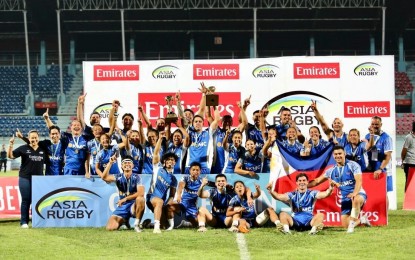 <p><strong>DOUBLE VICTORY.</strong> Members of the Philippine Volcanoes during the awarding ceremony of the Asia Rugby Emirates Sevens Trophy tournament in Kathmandu, Nepal on Sunday (Oct. 5, 2024). The Philippines men’s team defeated Chinese Taipei, 27-12, in the final, while the women's team secured the title after beating India, 7-5. <em>(Photo courtesy of Nepal Rugby Association)</em></p>