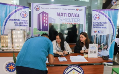 <p><strong>NATIONAL SHELTER MONTH.</strong> A man registers at a housing fair which opened on Monday (Oct. 7, 2024) at the Central Office of the Department of Human Settlements and Urban Development in Quezon City. The weeklong fair offers services from DHSUD’s key shelter agencies and showcases projects by private companies. <em>(Photo courtesy of the DHSUD)</em></p>