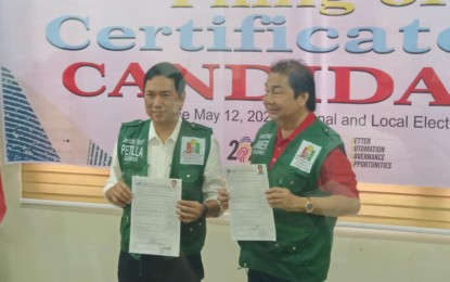 <p><strong>REELECTION BID.</strong> Leyte Governor Carlos Jericho Petilla (left) and running mate, Vice Governor Leonardo Javier, file their certificates of candidacy (COC) on Monday (Oct. 7, 2024). Since the start of the COC filing last Oct. 1, no other individual has formalized their participation in the race for the two highest positions in the province. <em>(PNA photo by Roel Amazona)</em></p>