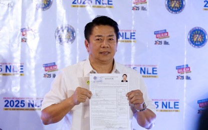 <p><strong>LAST-MINUTE FILER. </strong>TV host Willie Revillame is among those who beat the deadline of the candidacy filing for the 2025 midterm polls at The Manila Hotel Tent City on Tuesday (Oct. 8, 2024). The TV host is running for senator. (PNA photo by Avito Dalan)</p>