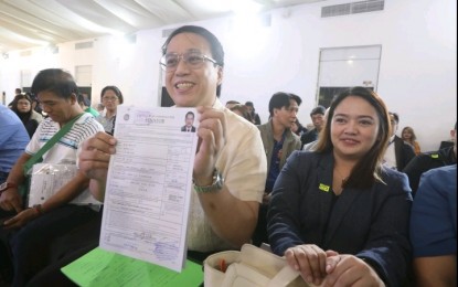 <p><strong>FOR SENATOR.</strong> The authorized representative of detained Kingdom of Jesus Christ leader Pastor Apollo Quiboloy files the religious leader’s certificate of candidacy for senator at The Manila Hotel Tent City on Tuesday (Oct. 8, 2024). Legal counsel Mark Tolentino said Quiboloy decided to seek a Senate seat to push for legislation promoting religious freedom, fast medical services, quality education and zero corruption. (<em>PNA photo by Bong Patinio)</em></p>