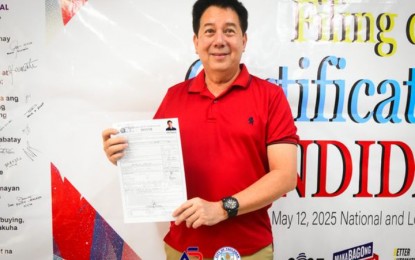 <p><strong>REELECTION BID</strong>. Tacloban City Mayor Alfred Romualdez shows his certificate of candidacy during his filing on Tuesday (Oct. 8, 2024). The Romualdezes have been leading the city government for over two decades. <em>(Photo from Alfred Romualdez's FB page)</em></p>