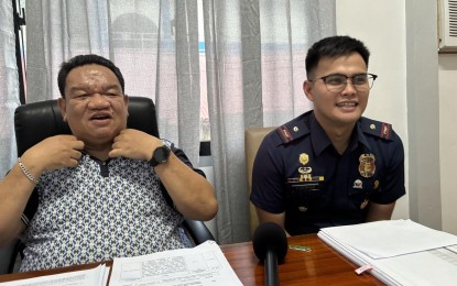 <p><strong>SECURITY ASSESSMENT.</strong> Comelec-NIR Regional Election Director Lionel Marco Castillano (right) and Lt. Stephen Polinar, spokesperson of the Negros Oriental Police Provincial Office, discuss security matters on Tuesday (Oct. 8, 2024). Castillano mentioned the possible intense political rivalry in the province ahead of the May 2025 elections.<em> (PNA photo by Mary Judaline F. Partlow)</em></p>