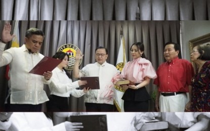 <p><strong>FULL-FLEDGED MAYOR</strong>. Department of the Interior and Local Government-Central Visayas Regional Director Leocadio Trovela administers the oath of office of Raymond Alvin Garcia as full-fledged Cebu City mayor on Wednesday (Oct. 9, 2024). In a briefing after the installation, Garcia vowed to make the completion of the Cebu City Medical Center a priority agenda of his administration. <em>(Photo courtesy of Cebu City PIO)</em></p>