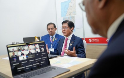 <p><strong>WHATEVER IT TAKES.</strong> Despite the busy schedule of the ongoing ASEAN Summit in Lao DPR, President Ferdinand R. Marcos Jr. convenes concerned government agencies in a meeting via teleconference on Wednesday (Oct. 8, 2024) to ensure the safety of Filipinos in the Middle East amid the unrest in the region. During the meeting, the President directed government agencies to evacuate Filipinos “by whatever means." <em>(PCO Photo)</em></p>