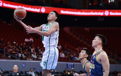 <p><strong>NEXT ROUND</strong>. College of Saint Benilde's Jhomel Ancheta scores on a layup during the game against Jose Rizal University in the NCAA Season 100 men's basketball tournament at the Mall of Asia Arena on Tuesday (Oct. 8, 2024). Saint Benilde marched to the second round on top of the ladder with a 7-2 win-loss card.<em> (NCAA photo)</em></p>