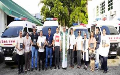 <p><strong>EMERGENCY VEHICLES.</strong> Bulacan Governor Daniel Fernando and Rev. Fr. Rodel Ponce with the local health officials and chief of hospitals during the blessing and ceremonial turnover of 10 new and refurbished ambulances to the district hospitals and health offices in the province. The event was held at Hiyas ng Bulacan Convention Center in the City of Malolos on Thursday (Oct. 10, 2024).<em> (Photo courtesy of Provincial Public Affairs Office)</em></p>