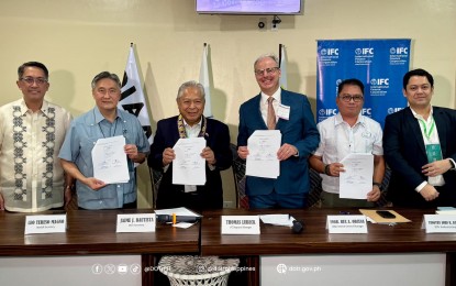 <p><strong>DEAL</strong>. Transportation Secretary Jaime Bautista (3rd from left) and executives of the International Finance Corp., the Mindanao Development Authority, and the Department of Transportation signed a Transaction Advisory Service Agreement for the modernization of the Davao International Airport (DVO) in Davao City on Friday (Oct. 11, 2024). Bautista said the agreement would fast-track the development of the DVO. <em>(Photo courtesy of DOTr)</em></p>