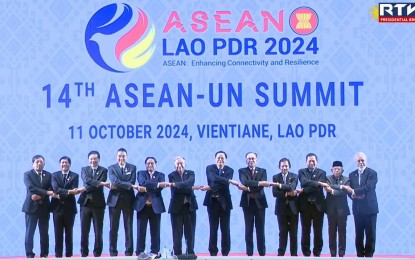 <p><strong>ASEAN-UN SUMMIT</strong>. President Ferdinand R. Marcos Jr. (2nd from left) and other leaders of the Association of Southeast Asian Nations take part in the traditional handshake at the 14th ASEAN-United Nations Summit in Laos on Friday (Oct. 11, 2024). President called on the ASEAN and United Nations to reaffirm their commitments to universal multilateralism, stressing its vital role in maintaining global stability.<em> (RTVM screengrab)</em></p>