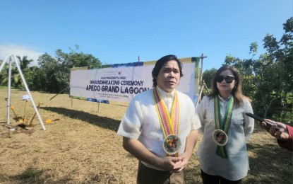 <p><strong>GRAND LAGOON</strong>. Aurora Pacific Economic Zone and Freeport Authority president and chief executive officer Gil Taway IV (left) and Board of Directors chairperson Anelyn Ciudadano talk to the media on the sidelines of the groundbreaking ceremony of the APECO Grand Lagoon in Casiguran, Aurora province on Friday (Oct. 11, 2024). The Grand Lagoon project is a new recreational facility inside the ecozone. <em>(PNA photo by Kris M. Crismundo)</em></p>