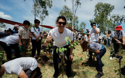 <p><strong>FOR THE ENVIRONMENT</strong>. Victorias City Mayor Javier Miguel Benitez leads the ceremonial planting of trees at Sitio Binintigan, Barangay XI on his 30th birthday on Oct. 8, 2024. He said the tree-planting and tree-growing initiative will plant 30,000 seedlings before his next birthday. <em>(Photo from Javier Benitez Facebook)</em></p>