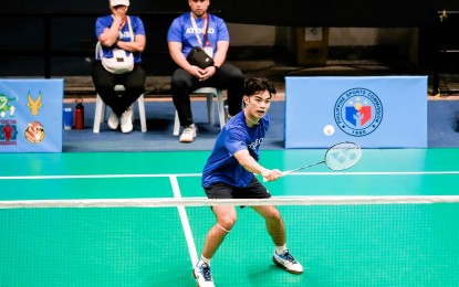 <p><strong>BACKHAND. R</strong>eigning Most Valuable Player Lyrden Laborte of Ateneo de Manila University prepares to hit a backhand return to Kyrik Roldan of Adamson University in the first singles of the UAAP Season 87 badminton tournament best-of-five tie at Rizal Memorial Badminton Hall in Manila on Saturday (Oct. 12, 2024). Laborte won, 21-10, 21-7, and Ateneo went on to blank Adamson, 5-0. <em>(UAAP photo)</em></p>