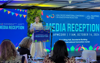 <p><strong>APMCDRR DAY ONE</strong>. Presidential Communications Office Senior Undersecretary Emerald Ridao represents Secretary Cesar Chavez at the media reception for the Asia-Pacific Ministerial Conference on Disaster Risk Reduction at Philippine International Convention Center in Pasay City on Monday (Oct. 14, 2024). The Philippines is hosting the conference on Oct. 14 to 18. <em>(PNA photo by Darryl John Esguerra)</em></p>