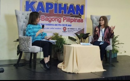 <p><strong>BOOST</strong>. Dr. Estela Cariño (right), Department of Education-Cordillera Administrative Region Director, during the Kapihan sa Bagong Pilipinas briefing in Baguio City on Tuesday (Oct. 15, 2024). She thanked the Marcos government for the funding that enabled them to hire at least 1,400 teaching and non-teaching staff. <em>(PNA photo by Liza T. Agoot)</em></p>