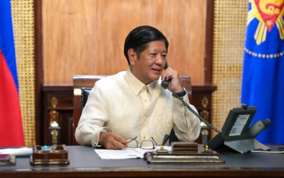 <p><strong><span data-preserver-spaces="true">PH-UAE TIES</span></strong><span data-preserver-spaces="true">. President Ferdinand R. Marcos Jr. talks with United Arab Emirates (UAE) President Sheikh Mohamed bin Zayed over the phone in this photo on social media posted Tuesday (Oct. 15, 2024). Marcos expressed his gratitude to the UAE leader for the pardon of 143 Filipinos in the Arab country, as well as for its assistance in the wake of the recent typhoons and flooding that hit the country. </span><em><span data-preserver-spaces="true">(Photo from Bongbong Marcos Facebook)</span></em></p>