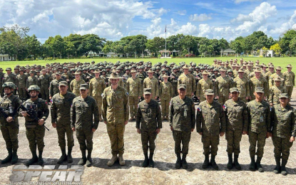 <p><strong>EXERCISE 'KASANGGA'.</strong> Troops of the Philippine Army's 9th Infantry Division and Australian Army gather for a group photo during the opening ceremony of Exercise 'KASANGGA' 2024-2 at Camp Elias Angeles, San Jose, Pili, Camarines Sur on Monday (Oct. 14, 2024). The drills cover critical areas, such as urban operations, close combat techniques, combat shooting, and tactical casualty care.<em> (Photo courtesy of the 9th Infantry Division, Philippine Army)</em></p>