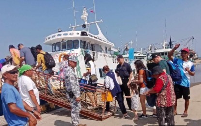 <p><strong>SEA TRAVEL.</strong> Passengers in Cadiz City, Negros Occidental board a vessel bound for Bantayan Island, Cebu on Nov. 1, 2024. Authorities on Wednesday (April 16, 2025) said the number of passengers in all ports nationwide is averaging over 200,000 per day since April 12, 2025. <em>(Photo courtesy of PCG)</em></p>