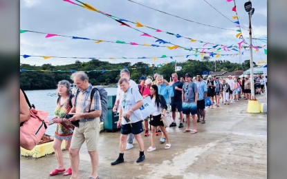 <p><strong>CRUISE TOURISTS.</strong> Passengers disembark the MS AIDAstella on Jan. 13, 2025 for a day at world-renowned Boracay Island. The post-pandemic return of cruise ships, carrying loads of visiting tourists to the Philippines, started during the first half of 2023.<em> (Photo courtesy of DOT-Western Visayas)</em></p>