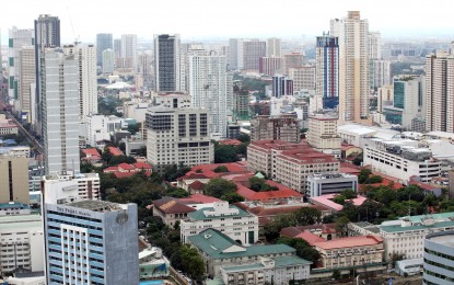 <p><strong>STRONGER ECONOMY</strong>. High-rise buildings as seen from Torre de Manila on Tuesday (Jan. 14, 2025). Finance Secretary Ralph Recto and the International Monetary Fund are optimistic that the Philippine economic growth will accelerate to over 6 percent this year and in 2026. <em>(PNA photo by Yancy Lim)</em></p>
